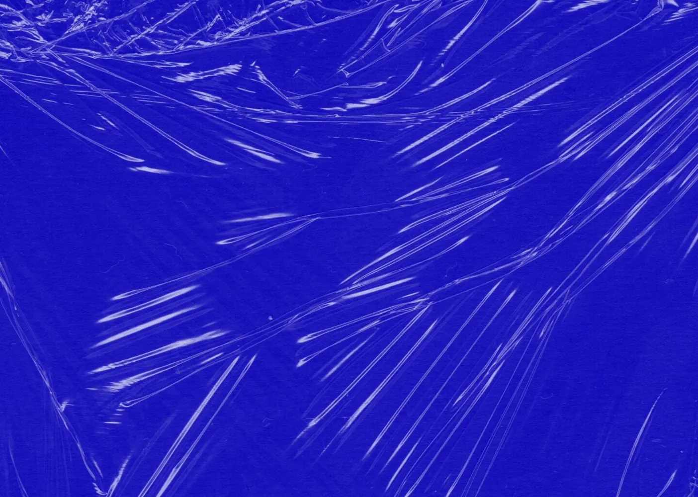 Close-up blue plastic film texture recovered from the original site